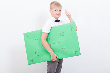 Image showing The boy holding a banner on white background