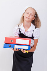 Image showing Schoolgirl with folders 