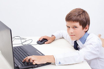 Image showing Boy using his laptop computer