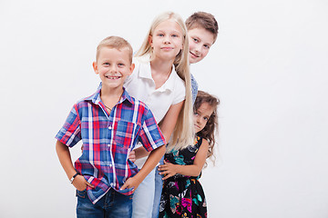 Image showing The smiling teenagers on white 