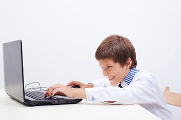 Image showing Boy using his laptop computer