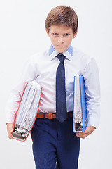 Image showing The boy with folders 