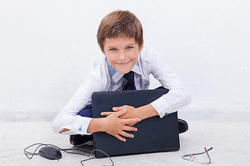 Image showing Boy using his laptop computer