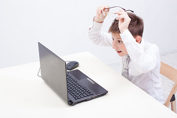 Image showing Boy using his laptop computer
