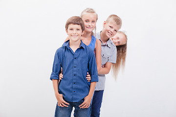 Image showing The smiling teenagers on white 