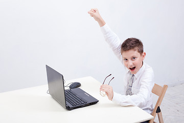 Image showing Boy using his laptop computer