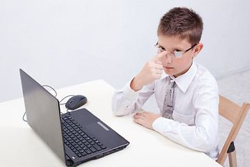 Image showing Boy using his laptop computer