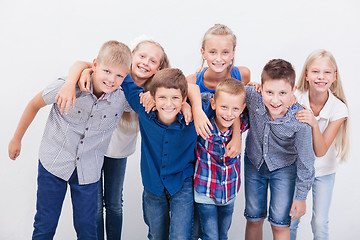 Image showing The smiling teenagers on white 