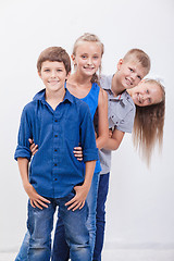 Image showing The smiling teenagers on white 