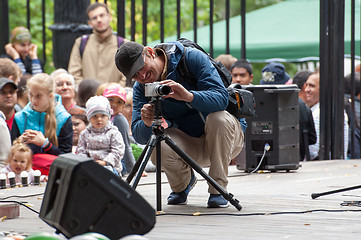 Image showing Photographer with tripod