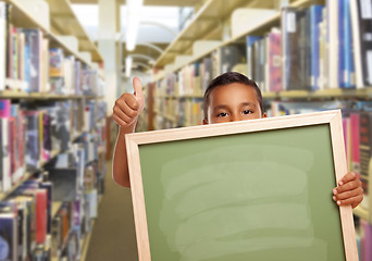 Image showing Hispanic Boy with Empty Chalk Board in Library