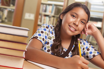 Image showing Hispanic Girl Student Studying in Library