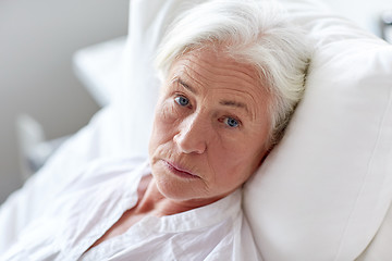 Image showing senior woman patient lying in bed at hospital ward