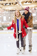 Image showing happy couple on skating rink