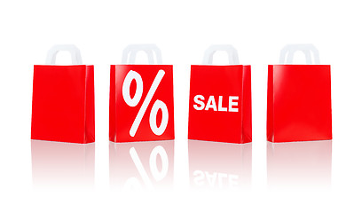 Image showing many red shopping bags with sale and percentage