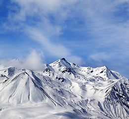 Image showing Winter snowy mountains in windy day