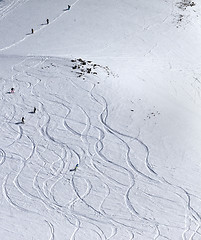 Image showing Snowboarder downhill on off piste slope with newly-fallen snow