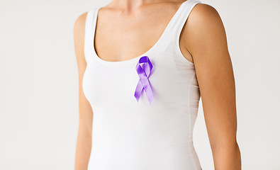 Image showing close up of woman with purple awareness ribbon