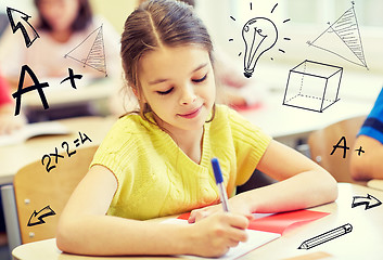 Image showing group of school kids writing test in classroom