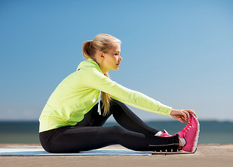 Image showing woman doing sports outdoors