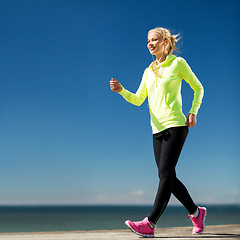 Image showing woman doing sports outdoors