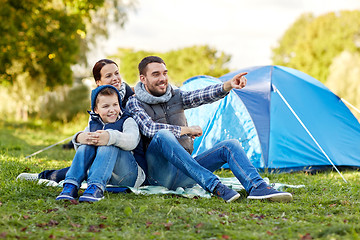 Image showing happy family with tent at camp site