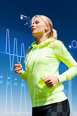 Image showing fit woman doing running outdoors