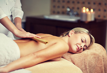 Image showing close up of woman lying and having massage in spa