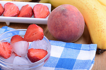 Image showing peach strawberry bananas mandarin close up as health food concept