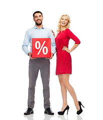 Image showing happy couple with red sale sign