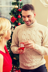 Image showing romantic man proposing to a woman