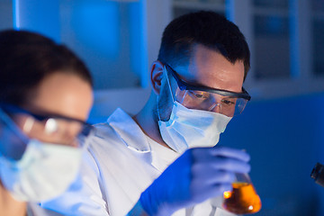 Image showing close up of scientists making test in lab