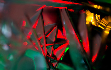 Image showing illuminated glass pattern bokeh over dark