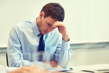 Image showing businessman having problem in office