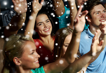 Image showing smiling friends at concert in club