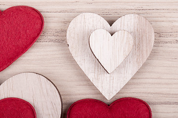 Image showing valentine\'s wooden hearts on a retro background