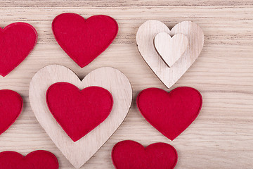 Image showing valentine\'s wooden hearts on a retro background