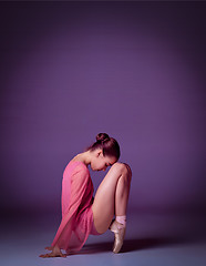 Image showing Young ballerina dancer showing her techniques