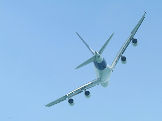 Image showing Wide-body airliner flying