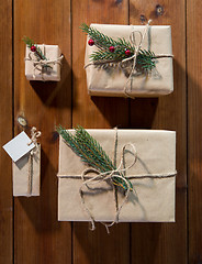 Image showing close up of christmas gifts with fir brunch