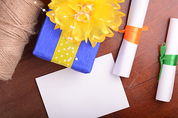 Image showing color gift boxes on wooden background