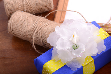 Image showing color gift boxes on wooden background