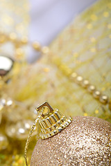 Image showing festive golden christmas decoration and white balls, close up