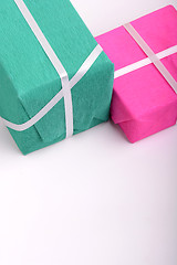 Image showing gift box set with white ribbon on white background