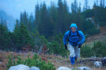 Image showing advanture man with backpack hiking