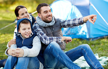 Image showing happy family with tent at camp site