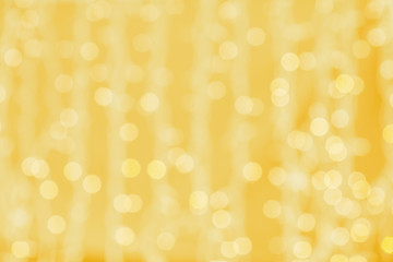 Image showing blurred golden background with bokeh lights