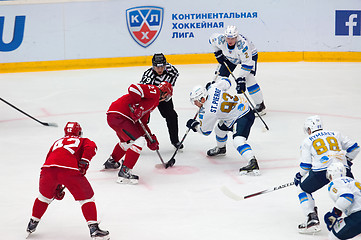 Image showing Y. Koksharov (27) vs M. St. Pierre (93) on faceoff