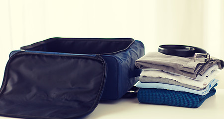 Image showing close up of business travel bag and clothes