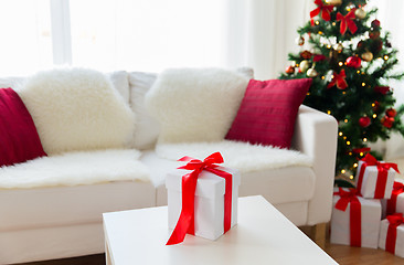 Image showing close up of christmas gift box on table at home